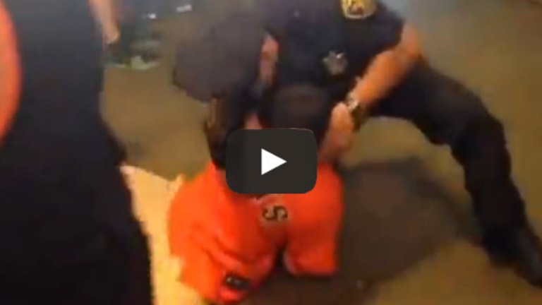Disturbing Video of Cop Trying to Choke a Handcuffed Teen Surfaces on Facebook