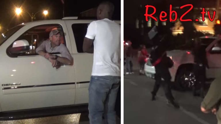 WATCH: Man Has a Debate With Protesters Then Plows Through Them