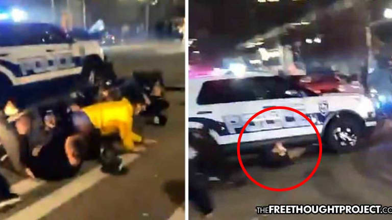 WATCH: Cop 'Fears for His Safety' and Plows Through Crowd As Bodies Go Flying