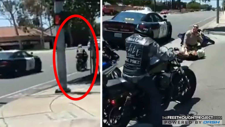 WATCH: Cop Deliberately Knocks Man Off Motorcycle with His Cruiser, Gets Swarmed by Bikers