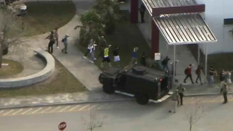 Cop Suspended As Video Shows He Cowered in Fear as Shooter Slaughtered Kids in The School