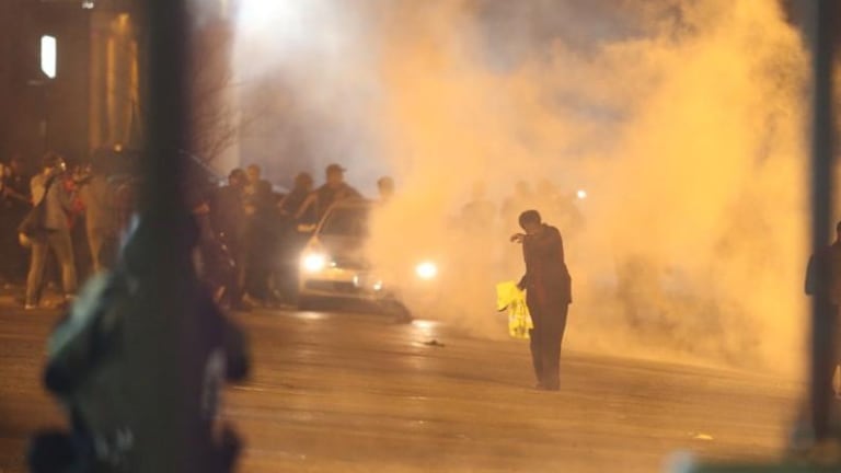 One Shot, 7 Arrested as Ferguson Police Disperse Protesters Defying Curfew