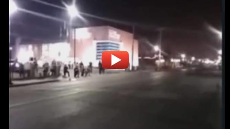 Graphic Video Captures Two Ferguson Police Officers Being Shot During Protest