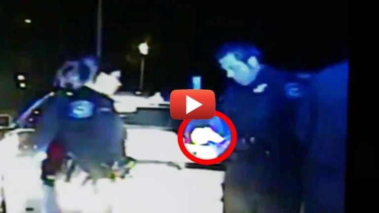 New Video Appears to Show Cops Planting Crack in Innocent Man's Car After Brutally Beating Him