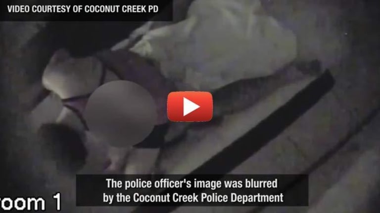Filming the Police Just Got Interesting, Cop Caught on Video Receiving "Illegal Massage"