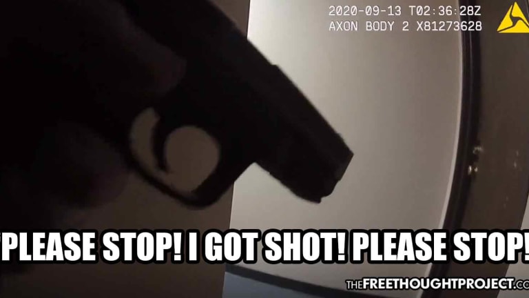 WATCH: Door Shuts, Scares Cop Who Then Shoots Innocent Unarmed Man Through Door