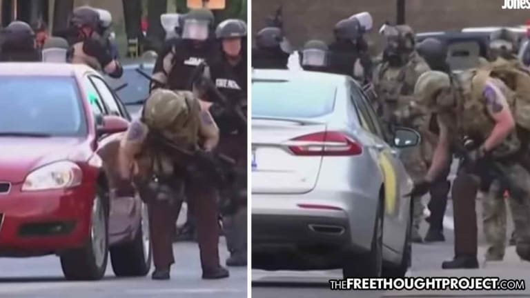WATCH: Cops Caught Slashing the Tires of Journalists' Parked Cars—For 'Safety'