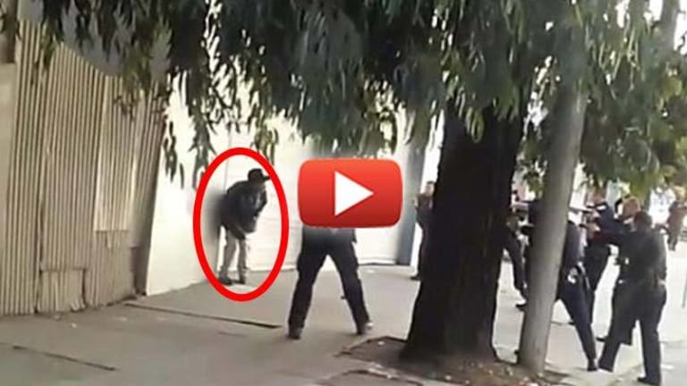 Public Execution by Firing Squad - Video Shows 10 Cops Unload on a Single Man with a Knife