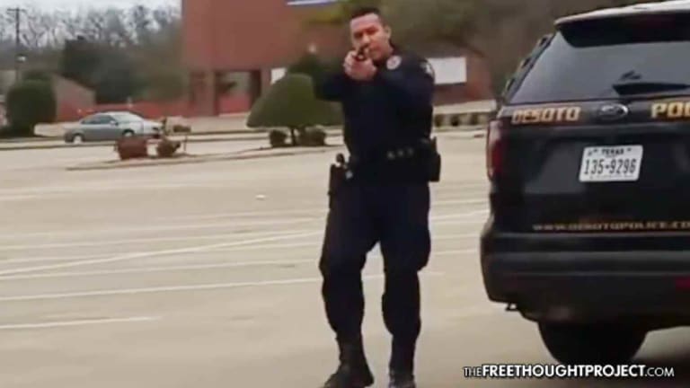 Video Shows Cop Snap, Hold Innocent Man at Gunpoint for Riding His Bicycle and Filming