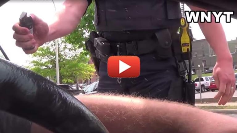 VIDEO: Man Pepper-Sprayed, Pulled from Vehicle and Arrested for Flipping the Bird