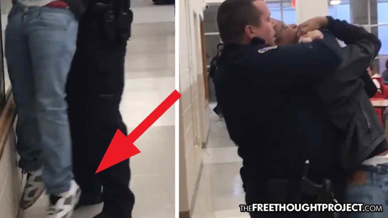 WATCH: Cop Suspended for Choking Child, Lifting Him Off the Ground BY HIS NECK