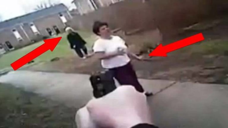 Body Cam: Coward Cop Shoots Woman Walking With Knife, Ignoring Innocent Woman Behind Her