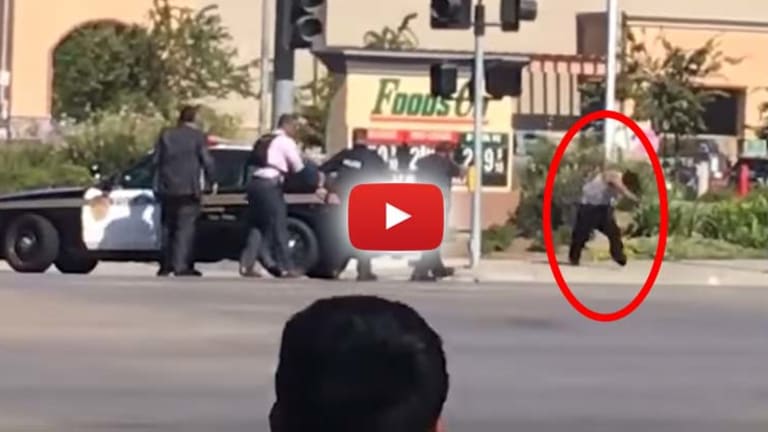 VIDEO: Cops Hide Behind Car, Execute Man in Firing Squad Fashion -- Claim he 'Lunged' at Them