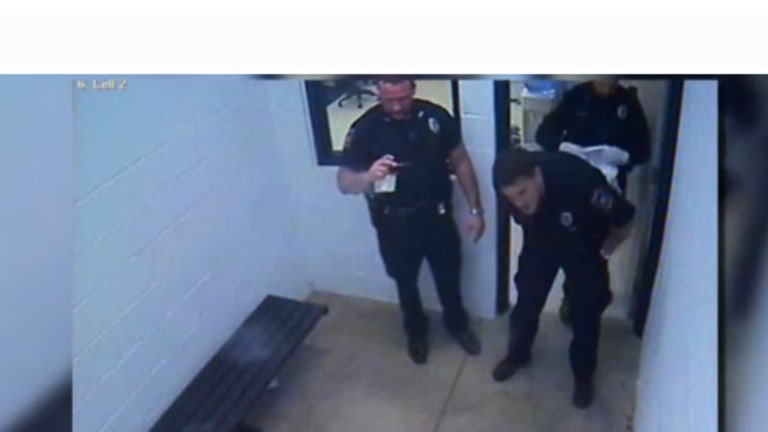 Surveillance Video: Cop Disfigures Handcuffed Man in Prison Cell. Films it With His Phone