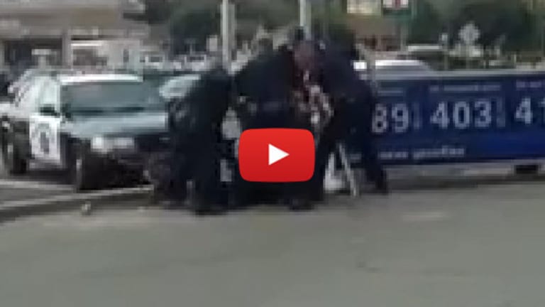 A Half Dozen Cops Beat This Homeless Man to a Pulp Then Attempt to Steal Witness Phones