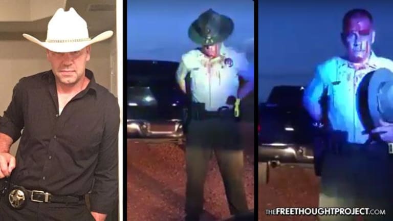 WATCH: Cop Paints Himself in Fake Blood to Scare Citizens into Worshiping Police