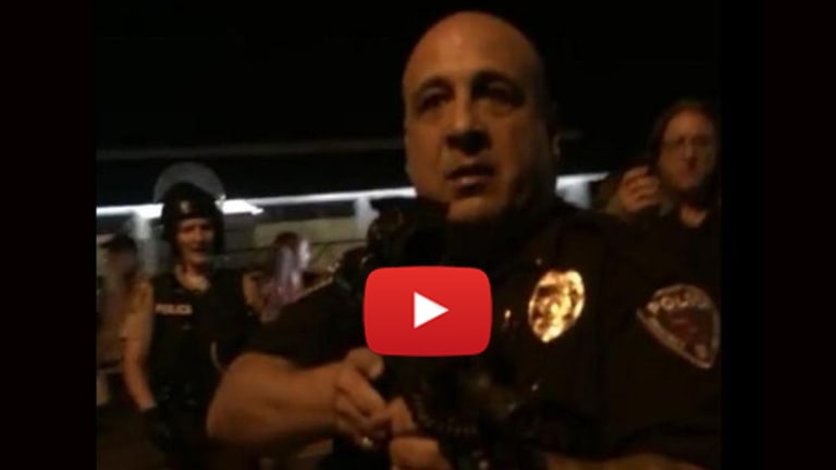 Ferguson Cop Points Gun at Journalists: “I’m Going to F***ing Kill You!”