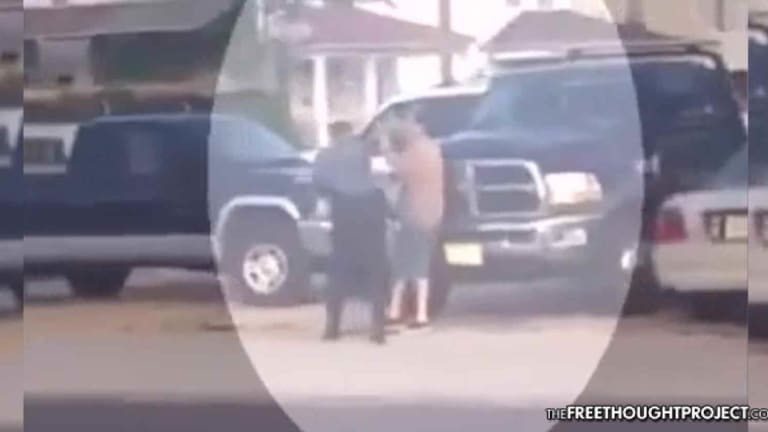 WATCH: Cop Walks Up to Unsuspecting Man, Sucker Punching Him in the Face