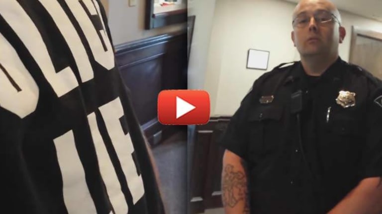 VIDEO: Man Kicked Out of Courtroom and Threatened with Jail For "Police Lie" Shirt