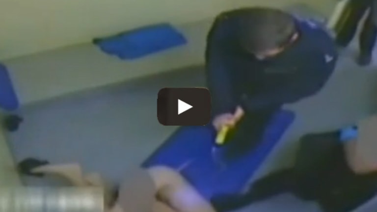Video Finally Released of Police Officer Tasering Naked Man in Jail Cell
