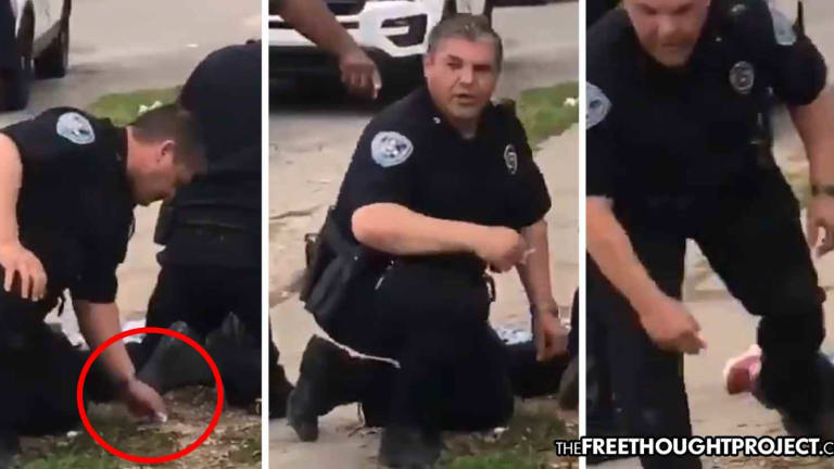 WATCH: Cop Loses It, Chases Woman Who Filmed Him Allegedly Planting Crack on Man