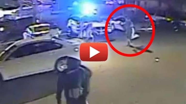 Video Refutes Cops' Story, Shows them Shooting Innocent Man through a Crowd of People