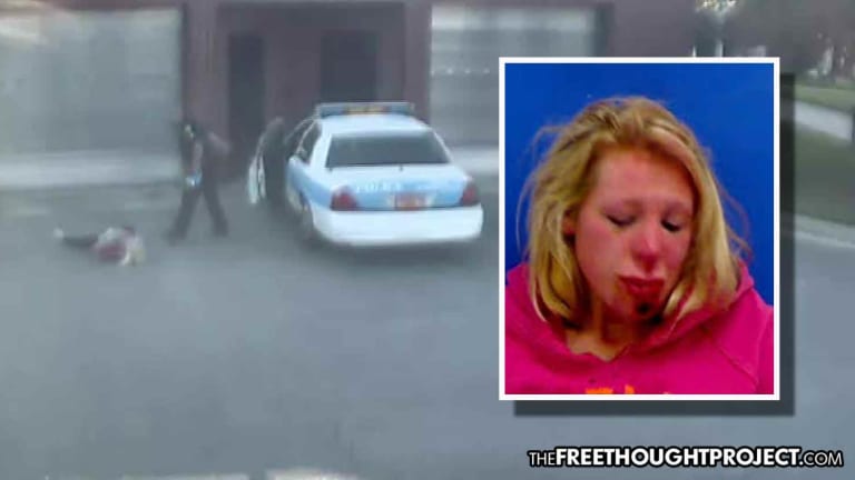 WATCH: Cop Smashes Handcuffed Woman into Concrete, Shattering Her Teeth Over Parking Ticket