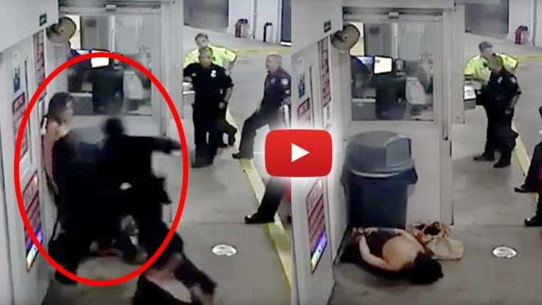 Video Shows Cops Do Nothing as Fellow Officer Brutally Beats a Handcuffed Woman