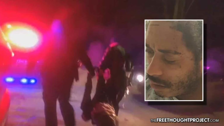 WATCH: Cop Turns Body Cam Away as Fellow Cop Starts Beating Handcuffed Man's Face
