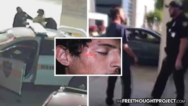 WATCH: Cop Beats Handcuffed Child, Spits on Mentally Ill Man, and Kills Someone—Can Still Be a Cop