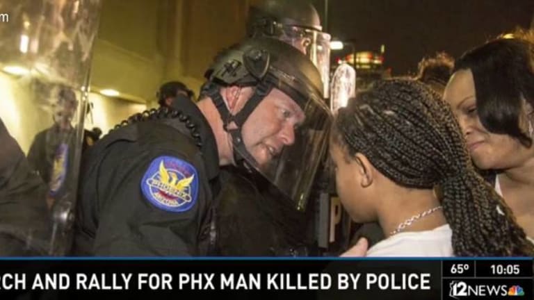 Riot Cop Apologizes To Daughter Of Unarmed Man Who Was Killed By Police on His Doorstep