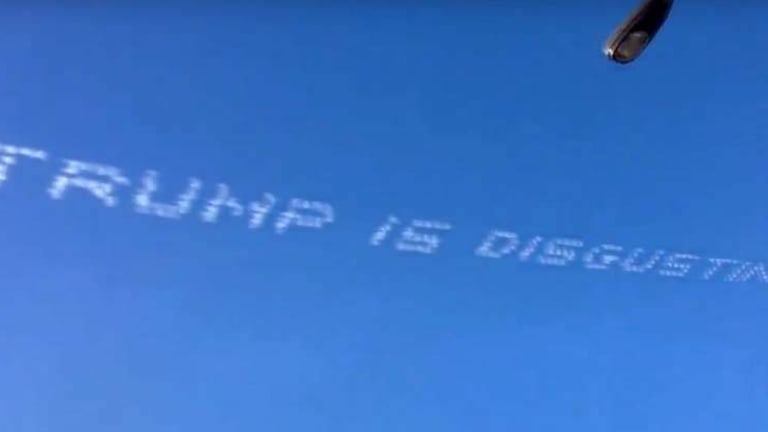 Trump Gets Trolled from Above - Skywriters Takeover Rose Bowl to Get their Message Out