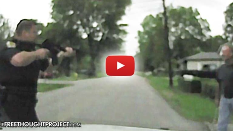 Graphic Video Of Cop Dumping AR15 Shots Into Man Shows Police Lied About Him 'Charging'