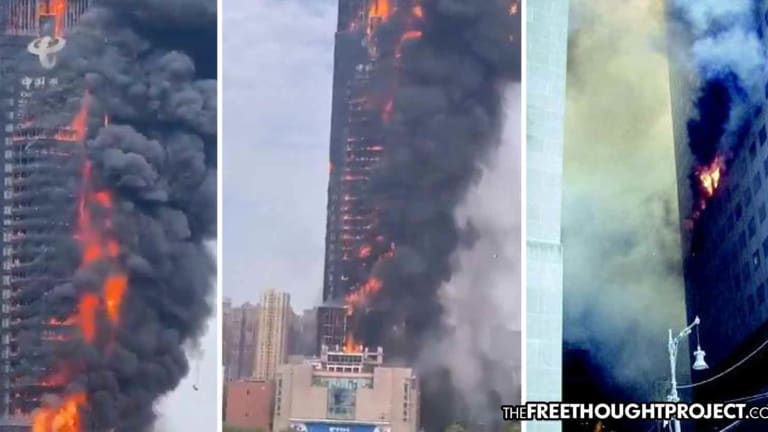 Opposite of Tower 7: Chinese Skyscraper Engulfed in Flames Does Not Collapse Into Own Footprint