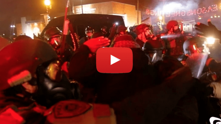 Protestors Carry Unconscious Woman to Cops for Help, Cops Open Fire With Tear Gas & Rubber Bullets