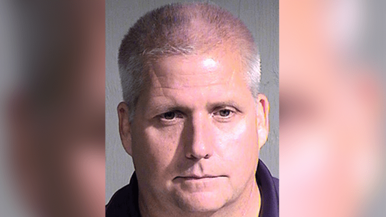 Phoenix Cop Arrested for Holding Arizona Congressman at Gunpoint