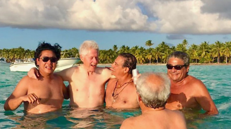 Leaked Photos Show Trump Insider, Who Was Arrested for Child Porn, Partying With Bill Clinton