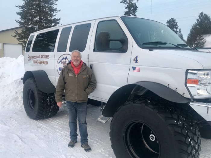 Jerry Johnson owns a business that rents snowmobiles and sends seven guided tours a day into Yellowstone National Park in the winter. His company is paying about $300 a day to help keep roads open and groomed during the partial federal government shutdown. Eric Whitney/Montana Public Radio
