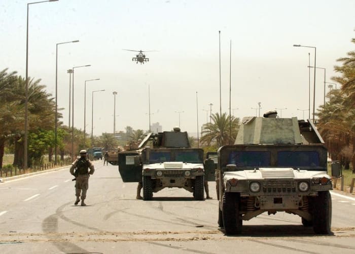 Environmentalists should argue for going beyond simply ‘greening’ military infrastructure. EPA/Mohammed Messara