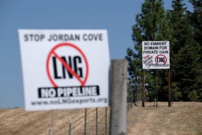 Signs opposing the Jordan Cove project. Such sights are typical in southern Oregon along the proposed pipeline route, where the project is controversial. (Alex Milan Tracy for ProPublica)