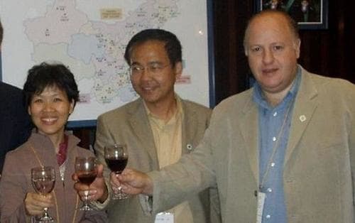 Wuhan Institute of Virology Shi 'Bat Lady' Zhengli toasts with Fauci-funded EcoHealth Alliance President Peter Daszak (emerging viruses group photo)