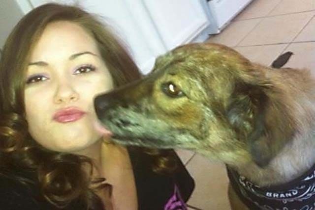 arah Hecht with her Australian-shepherd hybrid, Freckles, in this photo taken in March. The dog was run over by a police officer who believed the animal was a threat to children playing nearby.