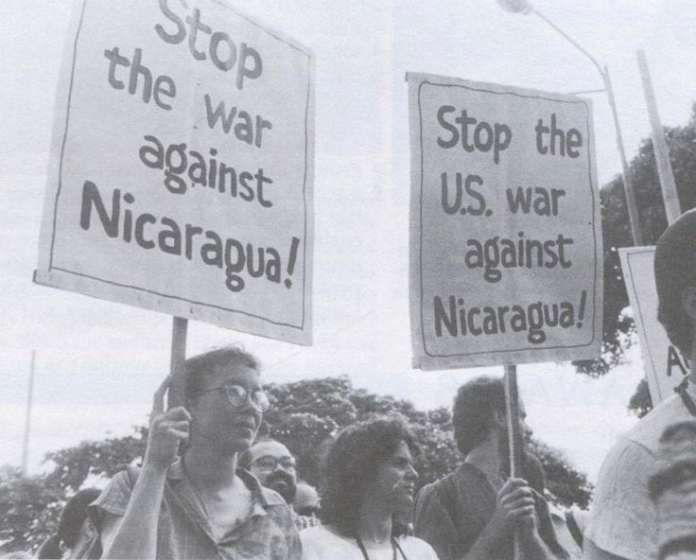 Peace activists protesting the U.S. war on Nicaragua in the 1980s. [Source: pinterest.com]