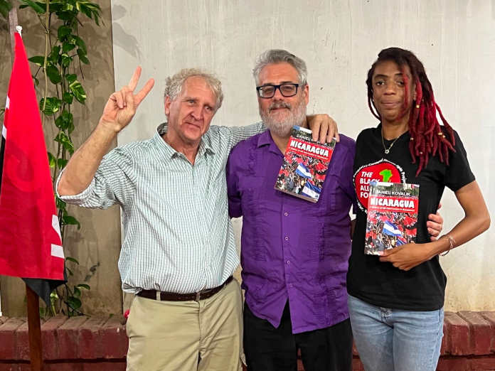 Dan Kovalik with raffle winners at book launch in Managua on July 17, 2023. [Source: Photo Courtesy of Lauren Smith]