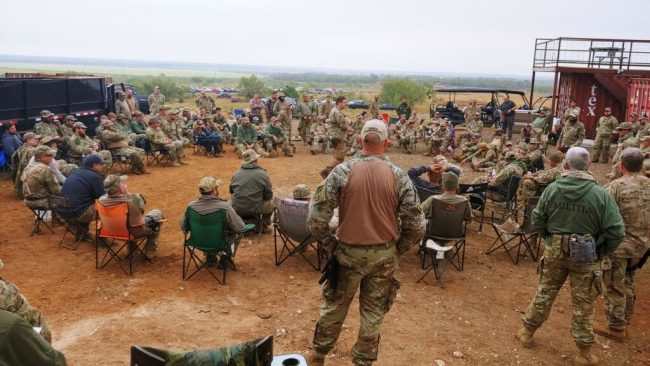 Members of the Texas State Militia at a Briefing. The modern militia movement comprises a morally superior force of good men and women ready to protect their communities against “government” (organized crime) overreach.