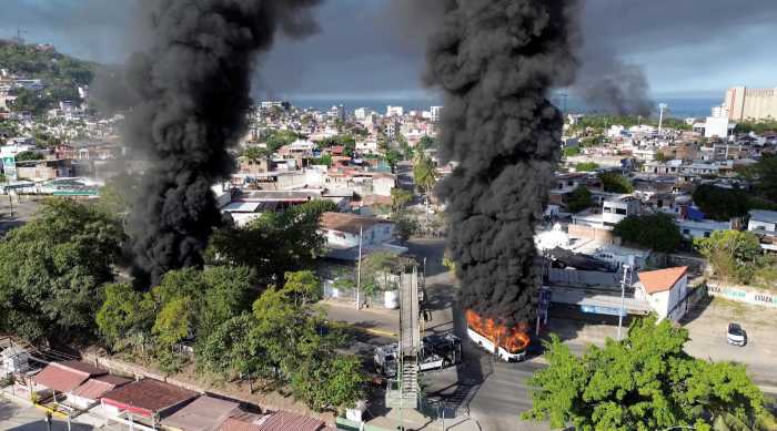 Smoke billows following a military operation in which Jalisco cartel head Nemesio “El Mencho” Oseguera was killed. [Source: nst.com.my]