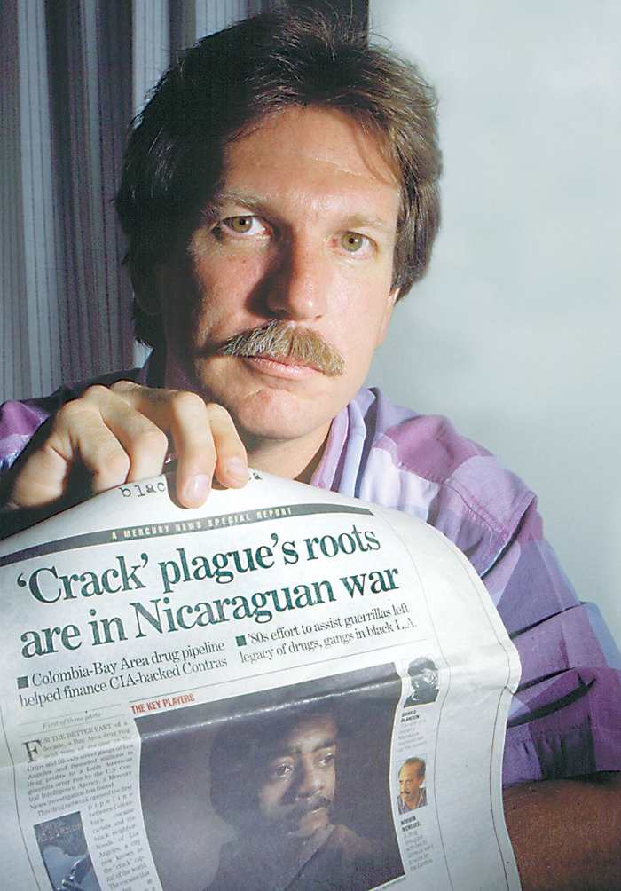 Gary Webb with his exposé about the CIA and crack. [Source: wikipedia.org]