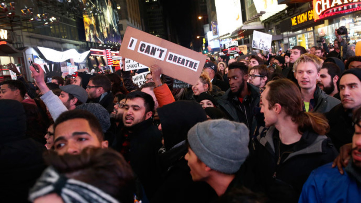 Demonstrators fill 7th Avenue in Times Square as they protest a grand jury decision not to charge a New York policeman in the choking death of Eric Garner, in New York December 4, 2014. (Reuters / Mike Segar)