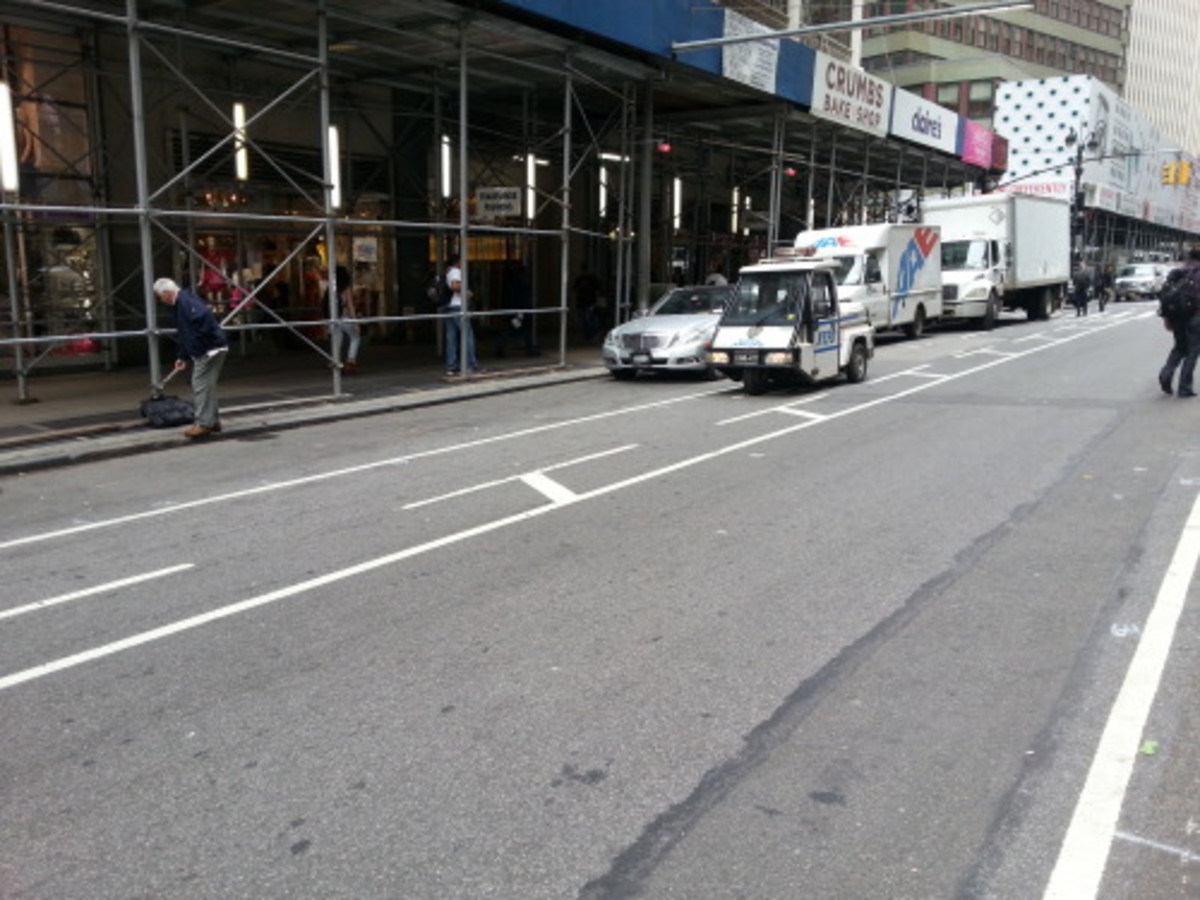 38th and Broadway, Manhattan. May 21. Submitted by a user who wishes to remain anonymous. Once again, lots of space but the officer decides to endanger cyclists.