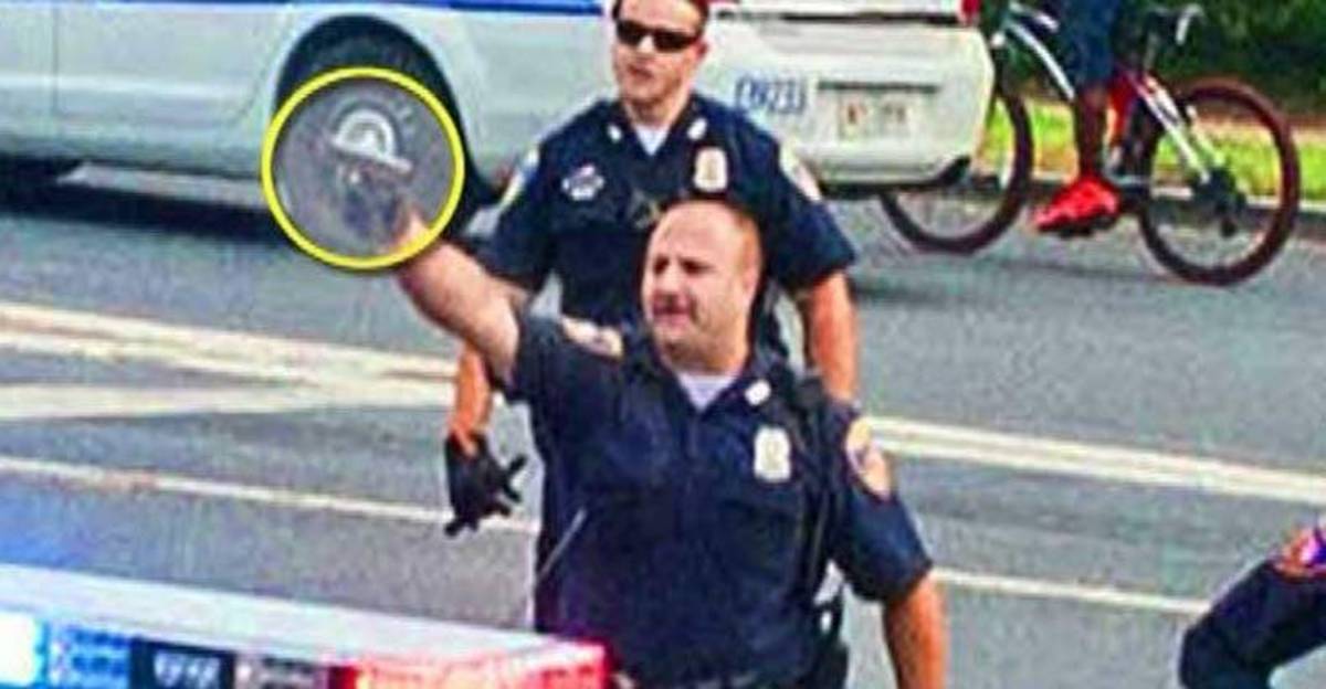 Baltimore-Cop-Caught-on-Camera-Pointing-Gun-at-Hundreds-of-Innocent-People